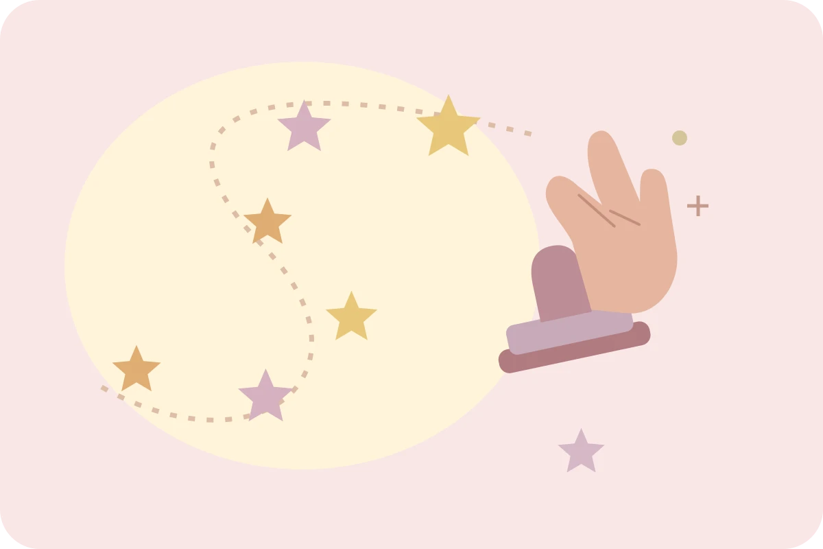 Star trail and a hand holding a stamp over a blush and champagne background
